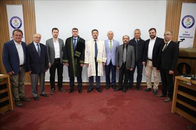 Doç. Dr. Mehmet Haskul’un cübbesini Rektörümüz Prof. Dr. Alkış giydirdi